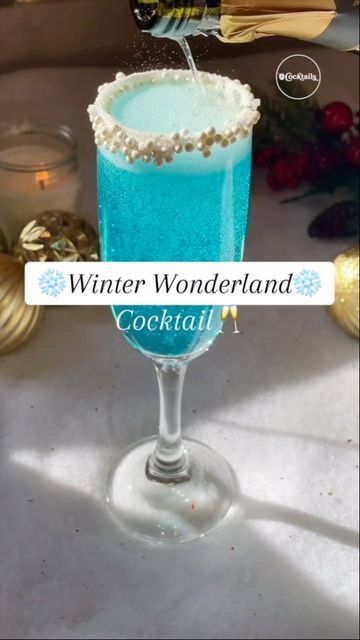 Winter Wonderland Party Food Ideas, Winter Wonderland Drinks For Adults, Winter Wonderland Drinks, Winter Prosecco Cocktails, Blue Prosecco Cocktails, Winter Wonderland Dinner Party, Blue Christmas Drink, Blue Winter Cocktails, Acotar Cocktails