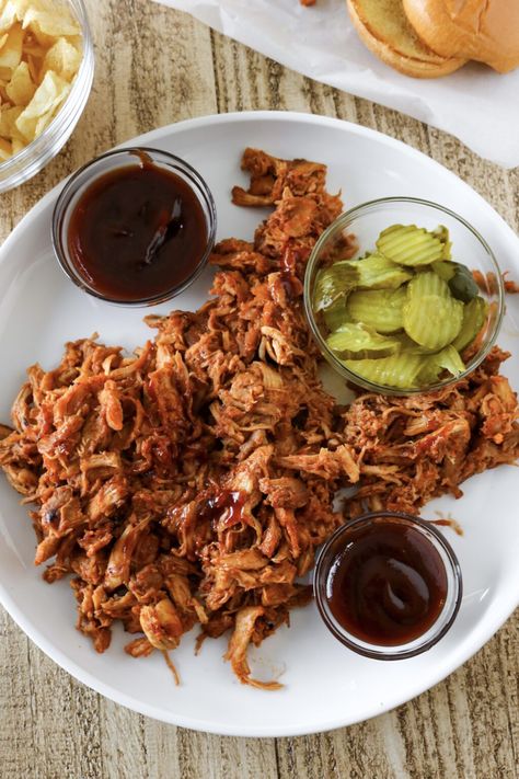 Dutch Oven Pulled Chicken - Layers of Happiness Oven Pulled Chicken, Chicken Dutch Oven, Oven Bbq Chicken, Pulled Chicken Recipes, Bbq Pulled Chicken, Dutch Oven Chicken, Bbq Chicken Thighs, Shredded Bbq Chicken, Bbq Sauce Chicken