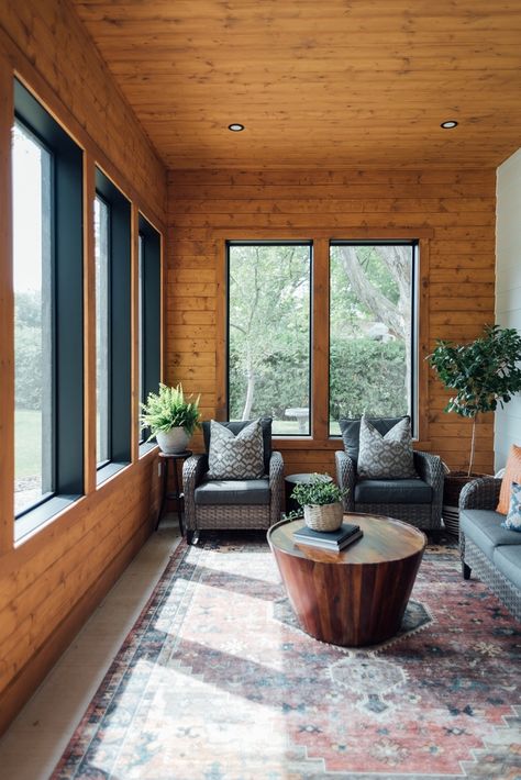 Wood Panel Exterior, Sunroom Wood Paneling, Sunroom With Wood Stove, Pine Siding Interior Walls, Natural Pine Walls, Pine Walls And Ceiling, Winter Sunroom, T111 Interior Walls, Pine Board Ceiling