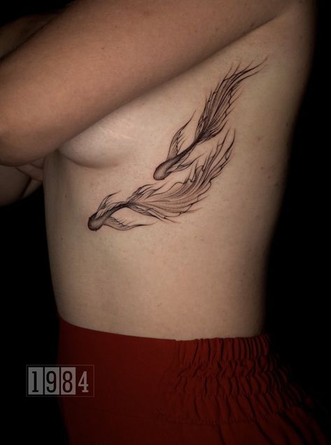 The Meaning Behind Koi Fish Tattoo | 1984 Studio - Tattoo & Piercing Koi Fish Tattoo On Ribs, Koi Fish Tramp Stamp, Fish Tattoo Women, Coy Fish Tattoos, Koi Fish Tattoos, Goldfish Tattoo, Beachy Tattoos, Upper Thigh Tattoos, Koi Tattoo Design