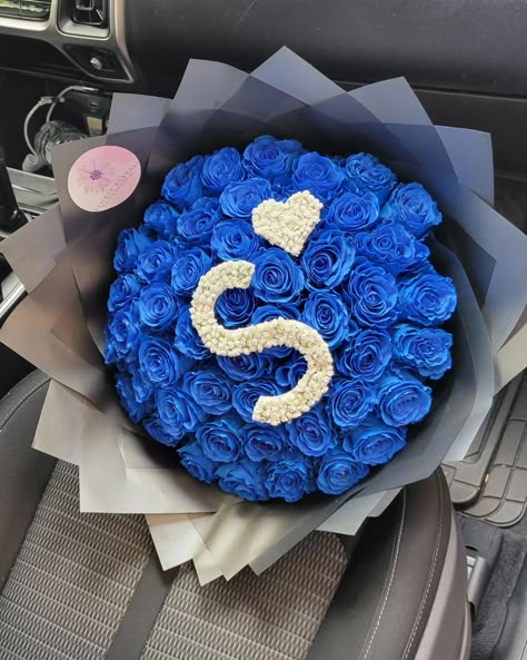 Blue roses with a baby breath initials 💙🤍 . . . Pre-Order your bouquet 💐 for any occasions. Add On's available, Crowns 👑, balloons 🎈, toppers , Sash , pins 📌, chocolates 🍫 Dm or send a whatsapp to 914-648 2510 Delivery available 📍Yonkers,NY . . #blueroses #gift #forhim #flowersofinstagram #roses #instagramreels #yonkersflorist #nyc #bronx #explore #organic Roses Bouquet Gift, Blue Flowers Bouquet, Valentine Desserts, Baby Breath, Glitter Roses, Blue Bouquet, Satin Roses, Beautiful Bouquet Of Flowers, Flowers Arrangements