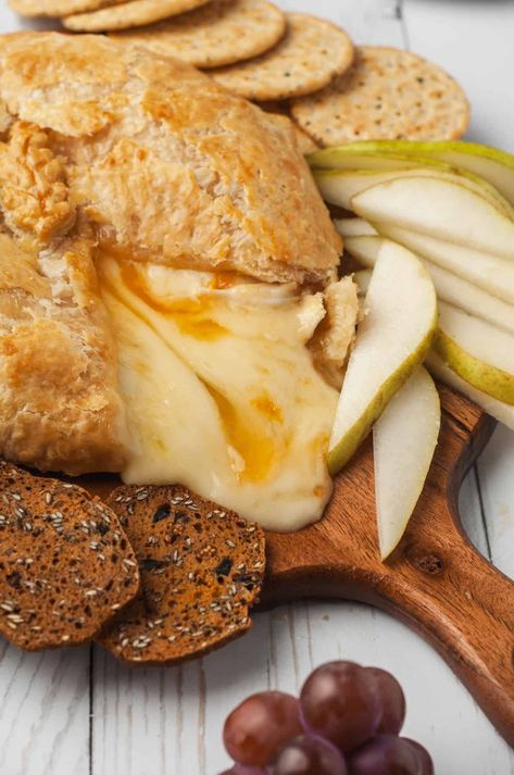 Everyone will flip for this baked brie recipe! Creamy, buttery brie is encased in flaky puff pastry with sweet apricot preserves for the ultimate party appetizer. Looks super fancy, but it’s so easy to make! #bakedbrie #puffpastry #brie #apricotpreserves #apricotjam #appetizer #cheese Baked Brie In Puff Pastry Honey, Baked Brie In Puff Pastry Savory, Baked Brie With Apricot Jam, Baked Brie In Pie Crust, Brie And Puff Pastry Recipes, Recipe Pie Crust, Baked Brie Puff Pastry, Baked Brie In Puff Pastry, Brie In Puff Pastry