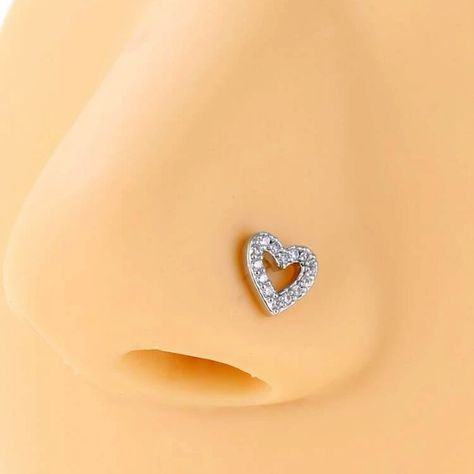 20g 1 Piece - Rhinestone Heart- Nose Stud “L Shaped” Nwt Great Restocked Item Grab This Adorable Nose Ring 1 Piece Rhinestone Heart Shaped Nose Stud Classy & Eye Catching “ L Shaped “ To Keep It In Place 20 Gauge 0.4 Of An Inch Length Total In Size *See Pictures Above For Measurements Please Make Sure You Clean All Body Jewelry Before Use For Safety. Item 4182,4183 Animal & Smoke Free Home Fast Shipping Usually Same Day! Bundle & Save $$ 5 Star Top Rated Seller / Posh Ambassador Silver Nose Stud Aesthetic, Heart Nose Piercing, Heart Nose Ring, Cute Nose Studs, Heart Nose Stud, Ootd Christmas, Heart Nose Rings, Pretty Piercings, Cute Nose Piercings