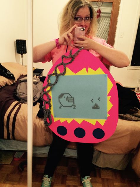 When you're invited to a 90s-themed costume party, you cut out lots of pixels, one at a time. You also crochet a chain. And then you become a Tamagotchi. Crochet A Chain, One At A Time, 90s Party, You're Invited, Cool Halloween Costumes, Diy Halloween Costumes, Youre Invited, Diy Costumes, Costume Party