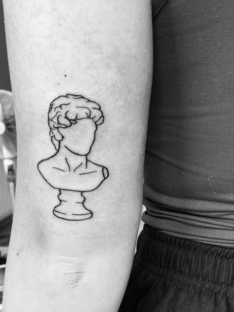 Minimalist male Roman bust tattoo David Statue Tattoo Minimal, Simple Greek Statue Tattoo, Small Statue Tattoo, Minimalist Statue Tattoo, Roman History Tattoo, Statue Of David Tattoo Simple, Greek Myth Tattoo Simple, Greek Statue Tattoo Drawing, Roman Bust Tattoo