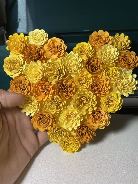 Hand rolled orange and yellow paper flowers, in the shape of a heart. Yellow Paper Flowers, Fall Cards Handmade, Embroidery Hoop Art Diy, Flower Shadow Box, Quilling Paper Craft, Paper Quilling Designs, Napkin Design, Yellow Paper, Quilling Designs