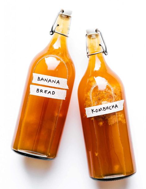 With mashed bananas, brown sugar, and cinnamon, this Banana Bread Kombucha recipe is a kombucha flavor to cozy up to this winter. Pear Kombucha, Pomegranate Kombucha, Green Tea Kombucha, Ginger Kombucha, Kombucha Recipes, Kombucha Bottles, Kombucha Flavors, Kombucha Recipe, Homemade Kombucha