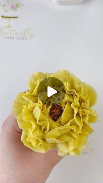 Kirsty on Instagram: "I may of completely covered up the green centre 🙈 oops. Still turned out pretty though, so all good. I love a ruffly frilly buttercream flower. I used sugarflair egg yellow with a tiny bit of progel ochre for the petals and I just love this shade. All supplies available on our shop and we ship worldwide ♥️ #cupcakequeen #buttercreamcupcakes #cupcakebouquet #floralpiping #cupcakebouquetsofinstagram  #buttercreamflowers #cupcakeart #cupcakesofinstagram #cakedecorating #floralcake #cupcakes #cupcakedesign #cakeart #flowerpiping  #cakedesign #cupcakeoftheday #cupcake #cakeideas #cakelove #cakedecorator #cupcakebouquet  #handpipedflowers #pipingflowers #pipingskills  #pipedflowers #pipingtutorial #buttercreamflowertutorial  #cupcaketutorial #cupcakes" Yellow Cupcakes Decoration, Yellow Flower Cupcakes, Work Cupcakes, Yellow Cakes Decoration, Cupcake Nozzle, Cupcake Decorating Techniques, Buttercream Flowers Cupcakes, Buttercream Flowers Tutorial, Cupcake Flowers