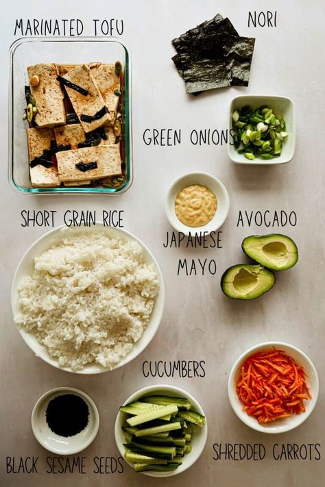 Vegan Sushi Bake combines the familiar flavors of sushi in a deconstructed, oven-baked format that's both easy to make and incredibly satisfying. If you like sushi, this vegan sushi bake is perfect for gatherings, potlucks, or just a cozy night in. Vegan Sushi Bake, Baked Sushi, Sushi Bake, Marinated Tofu, Vegan Sushi, Vegan Mayo, Vegan Side Dishes, Vegan Sides, Sriracha Sauce