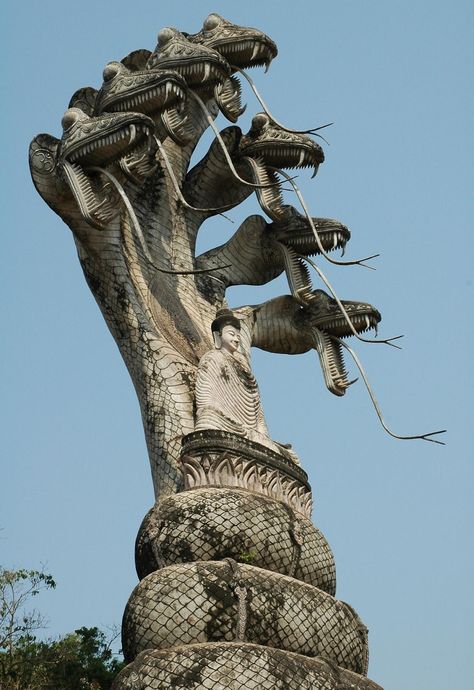 Buddha and the Seven-headed serpents statue in Sala Kaew Ku, Thailand. This statue represents the Buddha being protected by Muchalinda, the King Cobra of the Naga snakes. Buddhist Art, Sculptures & Statues, Asian Art, Beautiful World, Buddhism, Drake, Places To Travel, Greek Statue, Temple