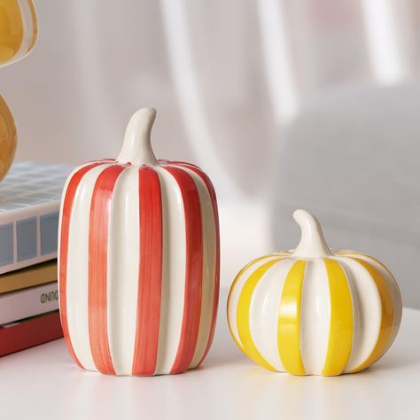 PRICES MAY VARY. MODERN & VIBRANT FALL PUMPKIN DECOR: Add a fresh and stylish touch to your autumn home decor with these uniquely designed artificial pumpkins. Featuring vibrant yellow mix white and red mix white striped patterns, they effortlessly enhance any space. Perfect for fall table decor, indoor fall decorations, and Thanksgiving home decor, these pumpkins create an inviting atmosphere that blends modern and seasonal charm. PREMIUM QUALITY CERAMIC PUMPKINS: Made from high-quality glossy Colorful Thanksgiving Decor, Shelf Decor Modern, Table Shelf Decor, Autumn Kitchen Decor, Indoor Fall Decor, Ceramic Pumpkins, Modern Fall Decor, Fall Pumpkin Decor, Pumpkin Decorations