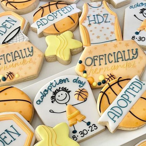 sara bogart on Instagram: "when your favorite color is orange, you love basketball and WERE JUST ADOPTED! welcome to your forever home team, Caden! 🏀✨ basketball balloon garland detail inspired by @courtneyscutout . . . #decoratedcookies #sugarcookies #cookies #royalicing #royalicingcookies #cookiedecorating #smallbusiness #adoption #adoptioncookies #dfwcookies" Adoption Day Cookies, Adoption Shower Theme, Missing Piece Adoption Party, Adoption Party Cookies, Adoption Cookies, Officially Ours Adoption Party, Adoption Finalization Party, Adoption Party, Love And Basketball