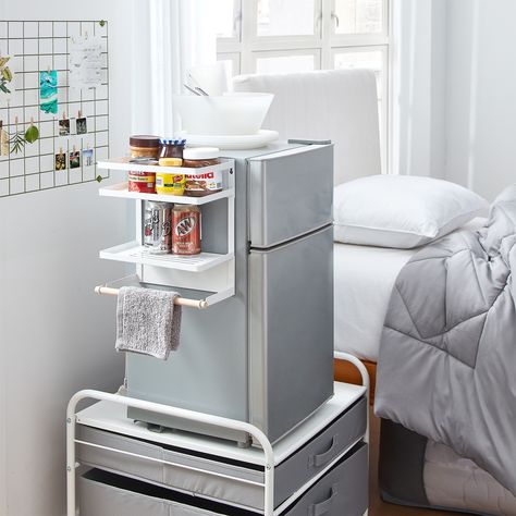 Features: Versatile shelving unit to maximize space in college dorm rooms, office breakrooms, and small kitchens Strong magnets on the back adhere shelves to your refrigerator, freezer, or compact mini fridge Wooden dowel holds paper towel for quick and… Dorm Kitchen Essentials, Dorm Closet Organization, Dorm Room Setup, Dorm Cooking, Dorm Fridge, Small Dorm Room, Small Dorm, Dorm Supplies, Fridge Organizer