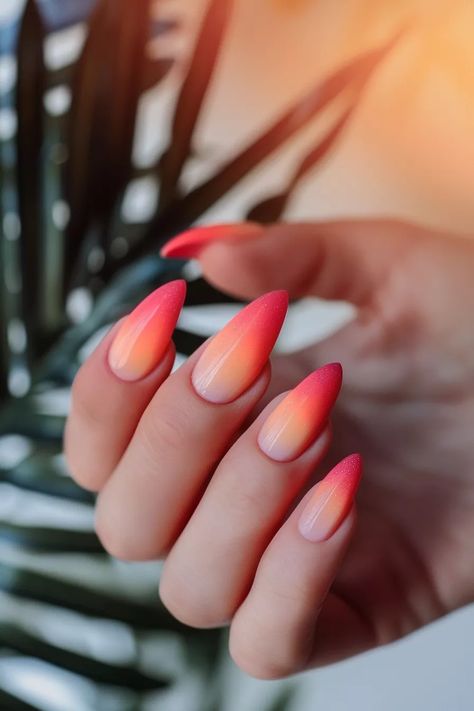 Pink Nail Inspo Perfect for Every Occasion Ombre Hot Pink Nails, Sunset Inspired Nails, Orange Pink Ombre Nails, Summer Ombré Nails, Sunset Nails Ombre, Ombre Orange Nails, Pink Orange Ombre Nails, Pink And Orange Ombre Nails, Orange Pink Nails