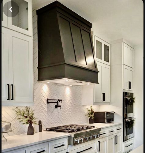 Black In Kitchen, White Kitchen Black Range Hood, Kitchen Ambient Lighting Ideas, Black Hoods In Kitchens, Kitchen French Modern, Farmhouse To Modern Makeover, Dinning Chandeliers Ideas, Kitchen Hallway Ideas, Kitchen Hood Backsplash Ideas