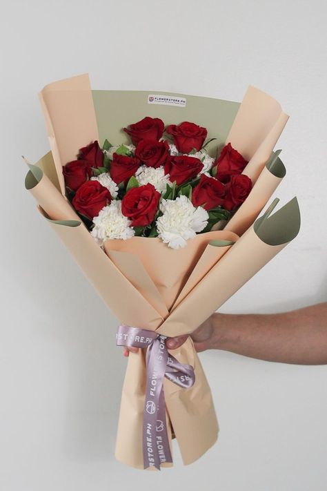 This stunning bouquet of gorgeous red roses mixed with delicate white carnations would definitely leave her in awe and speechless. Leaves Bouquet, White Carnations, Carnation Bouquet, Pink Flower Bouquet, Red Carnation, Bridal Bouquet Flowers, Red Rose Bouquet, Gift Delivery, Same Day Flower Delivery