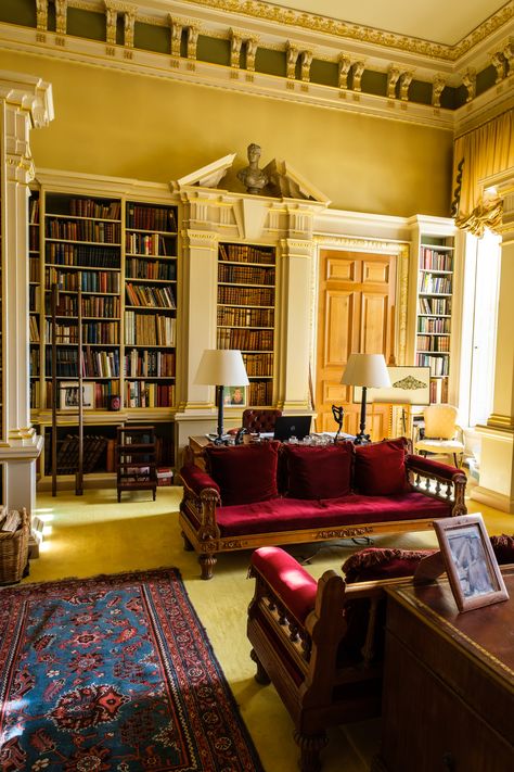 Maroon Library, Greek Revival Interior Design, Red Library Aesthetic, Vsp Interiors, Old Castle Library, English Country House Interior, Red Sofas, Castle Howard Interior, Colored Books