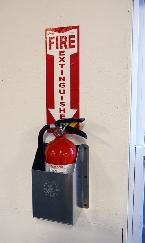 Always a good idea to have safety equipment in a safe place when working with machinery and tools. Store your extinguisher in a custom fit cabinet in an easily accessible spot. Mounts to your wall or secure to the floor in your garage, shop or trailer. Holds a 5 LB bottle. Dimensions: Inside diameter of cabinet is 5 ¾"W x 4 ½"D Dimensions:  11"H x 7.5"W x 4.75"D http://www.pitpal.com/holders/fire-extinguisher-holder-5-lb/ Fire Extinguisher Box Design, Fire Extinguisher Box, Fire Extinguisher Cabinets, Warehouse Project, Fitted Cabinets, Emergency Equipment, Visual Communication Design, A Safe Place, Garage Shop