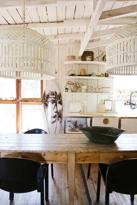 Inspired spaces with Interior Designer Leanne Ford Interiors | Billabong Oversized Light Fixtures, Leeann Ford Interiors, Rustic Farm Table, Black Cabin, Ford Interior, Bohemian Modern Style, Black Chairs, Vintage Cabin, White Interior Design