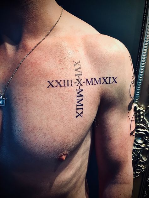 Mens chest tattoo numeral Date Tattoos Men, Roman Numeral Tattoo Men Chest, Chest Tattoo Bible Verse, Chest Tattoo Roman Numerals, Roman Numeral Birthday Tattoo, Mens Chest Tattoo, Roman Numeral Tattoo Men, Tattoo Roman Numeral, Roman Numbers Tattoo