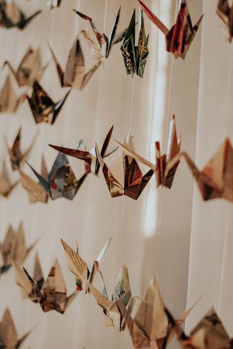 Recycled Wedding Decor, Wedding Paper Cranes, Origami Crane Wedding, Vintage Party Aesthetic, Ethereal Moodboard, Paper Cranes Wedding, Evermore Wedding, Wall Covering Ideas, Paper Crane Wedding