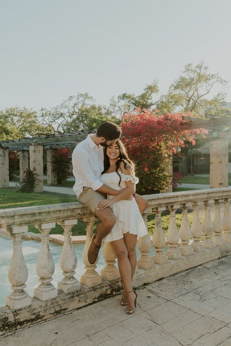 Coral Gables Entrance Park is a hidden gem in Miami, Florida, offering a beautiful and peaceful escape from the hustle and bustle of the city. The park features a stunning entrance with a fountain, arches, and lush greenery and bougainvillea plants that make for the perfect backdrop for your photoshoot. . Coral Gables Photoshoot, Wedding Park Photos, Romantic Garden Engagement Photos, Longwood Gardens Engagement Photos, Filoli Gardens Photoshoot, Garden Engagement Photoshoot, Pasadena Photoshoot, Botanical Garden Engagement Shoot, Greenery Photoshoot