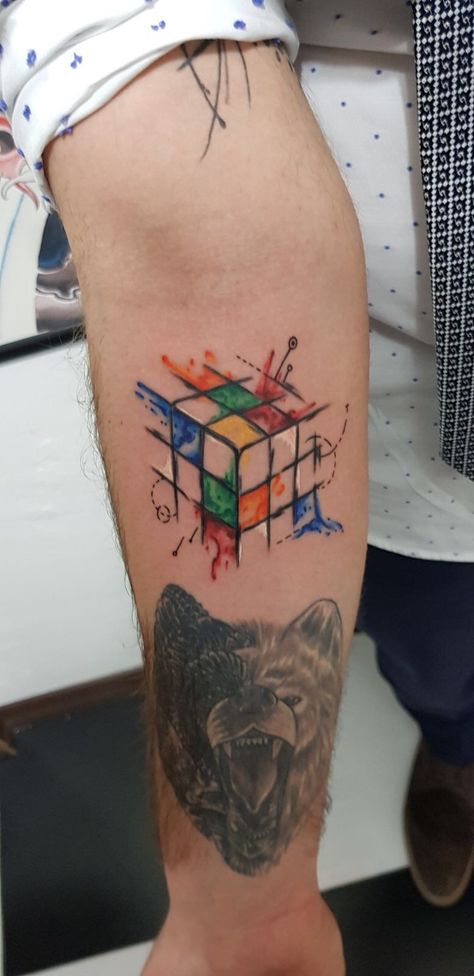 Rubik’s Cube Tattoo Red Blue White Green Orange Rubik's Cube Tattoo, Rubix Cube Tattoo, Cube Tattoo, Perspective Tattoos, Small Feather Tattoo, Music Tattoo Sleeves, Science Tattoos, Minimalistic Tattoo, Tattoo Red