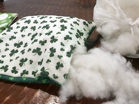 If you're looking for an easy way to change up your seasonal decor, then this idea for turning inexpensive hand towels into little pillows is just for you.This project is no-sew and all your supplies are easy and inexpensive to find. Here are the supplies you'll need. St. Patrick’s Day hand towels Heat N Bond Ultrahold  Polyfil Stuffing Rotary cutter Clear acrylic quilt ruler Iron  You can find links to all these supplies on my original blog post for this project Hand Towels Diy, Diy Upholstery Cleaner, No Sew Pillow Covers, Household Help, Diy Towels, Drop Cloth Curtains, Small Towel, Sewing Pillows, Diy Curtains