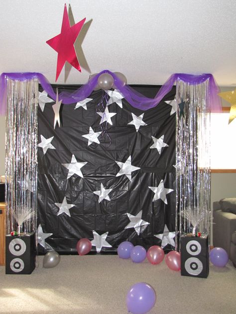 Created a stage and each guest received a blow up microphone. We turned on Hannah Montana music and let them sing and dance Rock Star Theme, Pop Star Party, Music Birthday Party, Rock And Roll Birthday, Rockstar Birthday, Rock Star Birthday, Rockstar Birthday Party, Dance Party Birthday, Star Birthday Party