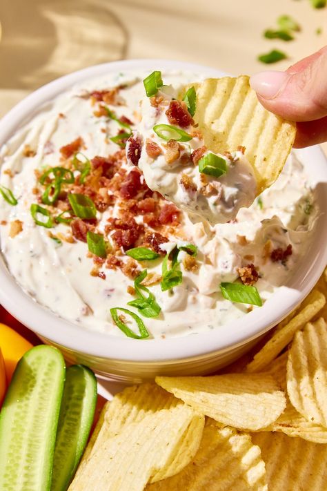 This High Protein Crack Dip recipe is perfect for the pool, parties, and snacking. It features a blend of Greek yogurt, ranch seasoning, cheddar cheese, crispy bacon, and green onions. A healthier twist on a classic favorite, it pairs perfectly with chips, crackers, or fresh veggies. This recipe is low carb and gluten-free and can also be tailored or be dairy-free. Easy Protein Pancakes, Yogurt Ranch, Greek Yogurt Ranch, Healthy High Protein Meals, Dairy Free Yogurt, Dairy Free Cheese, Dairy Free Options, High Protein Low Carb, Ranch Seasoning