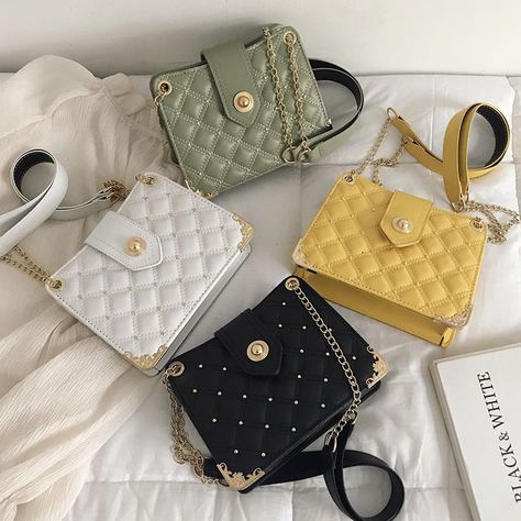 This quilted crossbody bag features a envelope-style fold-over flap embellished with a logo accent. Top handle with gold-tone ends. Magnetic snap-button closure. Product featured: fashion handbag This product is from UNAKU vendors' brand ID: 212V448 NGN 4,000.00 Shop at https://bit.ly/3mJvSbG Call to 07067786808 Pay on delivery available #ladybag #bag #bags #fashionbag #handbag #luxurybag #leatherbag #womenbag #brandbag #fashion #fashionbags #backpack #wallet #ladybags #lv #womensbag #lvlover Beg Tangan, Elegant Bags, Tasmania, Chain Bags, Coach Dinky Crossbody, Sling Bag, Fashion Handbags, Crossbody Shoulder Bag, Leather Fashion