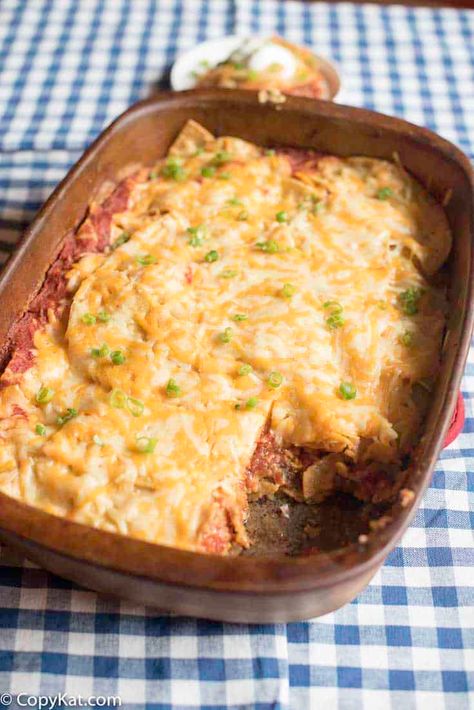 Make Ahead Taco Casserole is perfect for busy days and potlucks. Click to get the easy recipe. Enjoy a tasty Mexican casserole with tortillas, refried beans, ground beef, sauce, and cheese. Make ahead and freeze to bake later. Great for a Taco Tuesday or Cinco de Mayo family dinner. #casserolerecipes #makeahead #mexicanrecipes #tacotuesday #cincodemayo #freezermeal Make Ahead Taco Casserole, Casserole With Tortillas, Taco Casserole With Tortillas, Chorizo And Sweet Potato, Mexican Taco Casserole, Ground Beef Sauce, Slow Cooker Refried Beans, Mexican Corn On The Cob, Sweet Potato Enchiladas