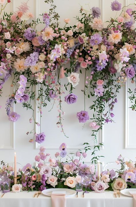 Save & follow for more inspiration! This stunning floral arrangement features a cascade of pastel blooms in shades of lavender, lilac, pale pink, and cream. Perfect for weddings or special occasions, the romantic design adds an elegant touch to any setting. Ideal for those seeking modern, sophisticated decor ideas or looking to purchase beautiful art prints of the image. #FloralInspiration #WeddingDecor #PastelFlowers #ElegantDesign #HomeDecor #ArtPrints #imageprompt #Aiimage Pastel Lilac Wedding Theme, Lilac And White Decorations, Lavender Pink Wedding Theme, Pastel Flower Arrangements Wedding Ideas, Pastel Lilac Wedding, Lilac And Silver Wedding Theme, French Lilac Wedding, Lilac And Pink Wedding Flowers, Pink And Lavender Wedding Theme