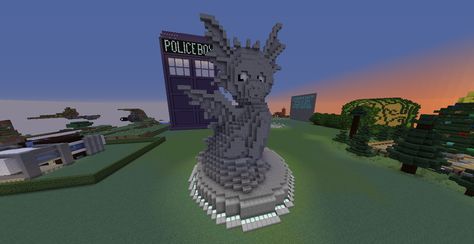 Gargoyle and Tardis made by Nityka Gargoyle Statue, Minecraft Buildings, Minecraft Builds, Statue Of Liberty, Minecraft, Statue, Building, Travel, Quick Saves