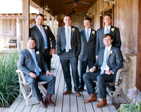 The gentlemen wore gray suits with brown cowboy boots, but the groom gave them ties to represent their personalities. They wore hydrangeas wrapped in twine as boutonnieres to retain the rustic theme. Suit With Cowboy Boots, Gray Groomsmen, Cowboy Boots Men, Gray Groomsmen Suits, Cowgirl Boots Wedding, Wedding Cowboy Boots, Cowboy Boot Outfits, Groomsmen Grey, Gentlemen Wear