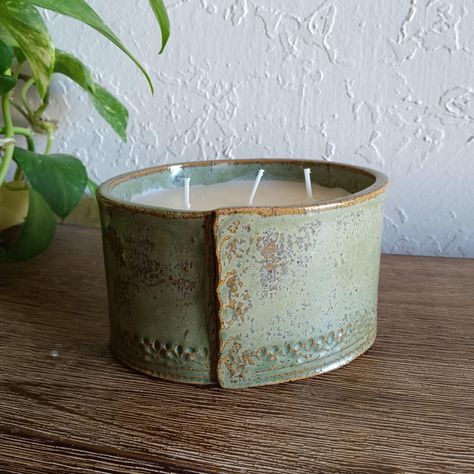 Our candles are hand built pottery vessels made from stoneware or porcelain clay, decorated with non-toxic glazes, and filled with natural, organic white beeswax.    Round candles are approx. 3.5 in tall and 4 in in diameter.  Oval candles are approx. 3.5 in tall and 5.5 in wide.  No refunds; each pottery piece is handmade and will have slight imperfections. If something is not quite right, please message me & I will work directly with you to solve the issue.  *Actual colors may very. I cannot guarantee that the color you see accurately portrays the true color of the product. Actual color and design may vary slightly from photos.  *Designs/patterns imprinted on pottery pieces are shown in pictures. Some designs/patterns are more subtle than others and may be harder to see. Actual designs/p Ceramics Projects Handbuilding Pottery Ideas, Cool Ceramics Projects, Hand Built Pottery Ideas For Beginners, Beginner Pottery Hand Building, Pottery Handbuilding Ideas, Handbuilding Pottery Ideas, Hand Built Pottery Ideas, Hand Build Pottery, Pottery Candles