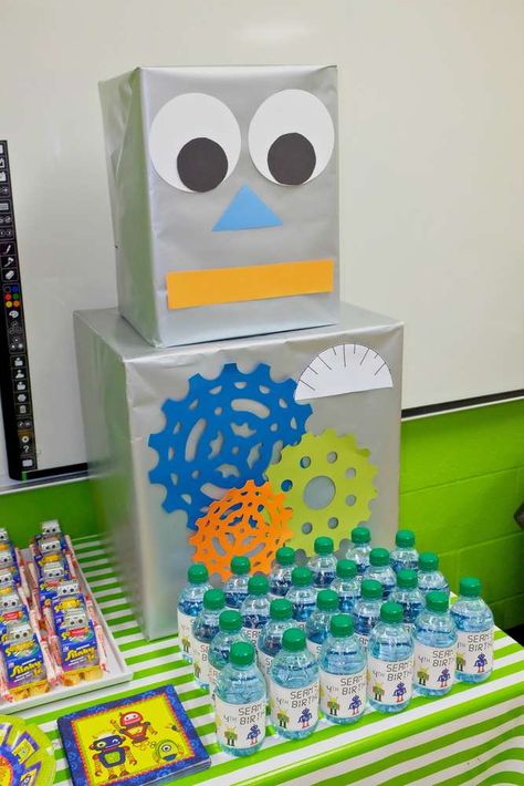 Cool decorations at a robot birthday party! See more party planning ideas at CatchMyParty.com! Robots Party Theme, Robot Birthday Party Decorations, Robot Party Ideas, Maker Fun Factory Vbs 2017, Maker Fun Factory Vbs, Robot Cake, Maker Fun Factory, Cool Decorations, Robot Birthday Party