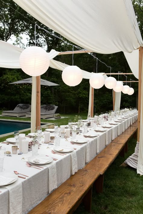 Summertime Feasting with Zimmermann | EyeSwoon White Outdoor Party Backyards, Outdoor Event Decor Summer Parties, Backyard Tent Engagement Party, White Garden Party, Outdoor Wedding Dinner Lighting, Outdoor Dinner Party, Outfoor Wedding Lights, Dinner Party Decorations, Outdoor Dinner Parties