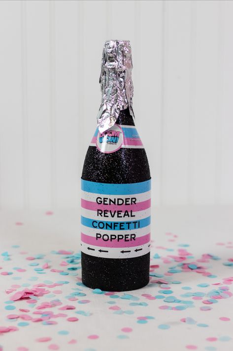 A popper shaped like a champaign bottle for gender reveal Popping Bottles Gender Reveal, Poppin Bottles Gender Reveal, New Years Gender Reveal Ideas, Champagne Gender Reveal, New Years Gender Reveal, Gender Reveal Poppers, Confetti Gender Reveal, Confetti Poppers, Poppin Bottles