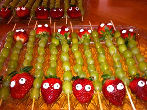 Snacks on a stick! These are Dragons! I used grapes, strawberries, candy eyes on a skewer. They could also pass as the Hungry Caterpillar, ( same colors)! Dragon Food Ideas, Dragon Snacks, Fruit Kabobs Kids, Dragon Food, Vbs Snacks, Class Snacks, The Hungry Caterpillar, Dragon Baby Shower, Catering Food Displays