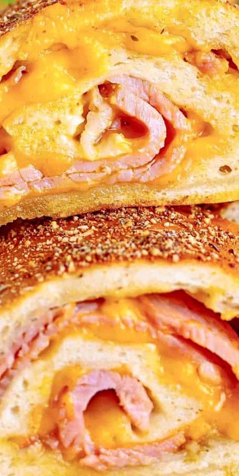 Ham and cheese gets a fun twist with this Ham and Cheese Stromboli! An easy recipe that only requires a handful of ingredients and is perfect for leftover ham! Ham And Cheese Stromboli Recipe, Ham And Cheese Stromboli, Cheese Stromboli Recipe, Cheese Stromboli, Stromboli Recipe Easy, Homemade Stromboli, Stromboli Recipe, Easy Ham, Leftover Ham