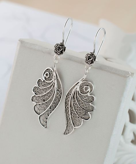 Spread your style wings and let your look soar with these heavenly 925 Sterling Silver Angel Wings Dangle Earrings! 💫 Handcrafted with exquisite filigree art, these earrings are the perfect blend of elegance and whimsy. Ready to make a statement that's both divine and daring? ✨⁣ ⁣ Click to shop or learn more! ➡️ https://nuel.ink/5b5arR⁣ ⁣ #AngelWingsEarrings #SterlingSilverJewelry #EtsyFinds Filigree Jewelry Design, Art Angel, Silver Angel Wings, Angel Jewelry, Filigree Necklaces, Filigree Jewelry, Silver Wings, Eu Countries, Filigree Earrings