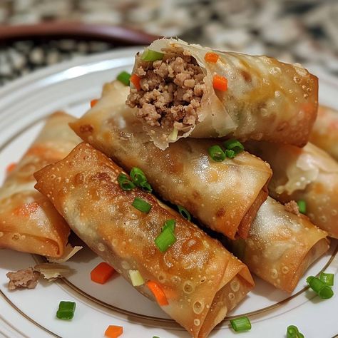 🌟🥟 Enjoy the crispy, savory delight of Lumpia Shanghai, a favorite Filipino snack! #LumpiaShanghai #FilipinoFavorites 🍽️ Lumpia Shanghai 🛒 Ingredients: 500 grams ground pork 100 grams carrots, finely chopped 50 grams onion, finely chopped 3 cloves garlic, minced 50 grams green onions, chopped 20 lumpia wrappers Salt and pepper to taste Oil for frying 👩‍🍳 Instructions: Prepare Filling: Mix ground pork, carrots, onion, garlic, and green onions. Season with salt and pepper. Wrap Lumpia: Plac... Pork Shanghai Lumpia, Lumpia Shanghai, Filipino Snacks, Instagram Recipes, Twisted Recipes, Egg Roll Recipes, Trending Recipes, Gcse Art, Party Food Appetizers