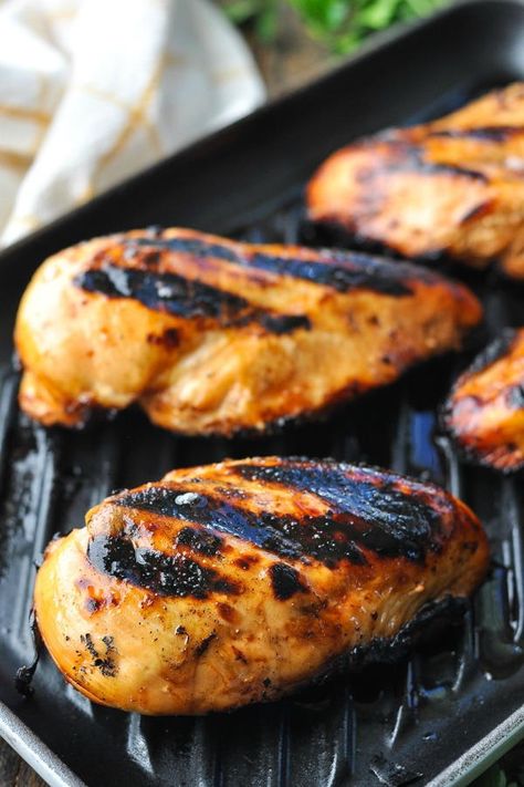 This easy Lemonade Chicken recipe is crispy on the outside, juicy on the inside, and full of flavor from the sweet-and-savory marinade. A simple dinner is ready for the table with just 5 minutes of prep and 5 ingredients! Is there anything more reminiscent of warm summer months than a cold glass of lemonade and some chicken on the grill? This easy dinner combines two of our favorites in one delicious Lemonade Chicken recipe! The meat is slightly sweet, refreshing, light and healthy. Pair it ... Lemonade Chicken, Easy Lemonade, Chicken On The Grill, Slow Cooker Times, Sweet And Sour Sauces, The Seasoned Mom, Winter Cooking, Healthy Cake Recipes, Simple Dinner