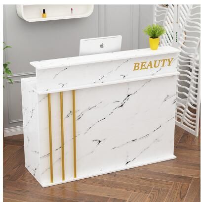 Nail Salon Reception Desk, Shop Cash Counter Design Modern, Small Reception Table Design, Salon Counter Design, Front Desk Design Receptions, Cash Counter Table Design Shop, Counter Table Design Shop, Shop Counter Ideas, Small Reception Table