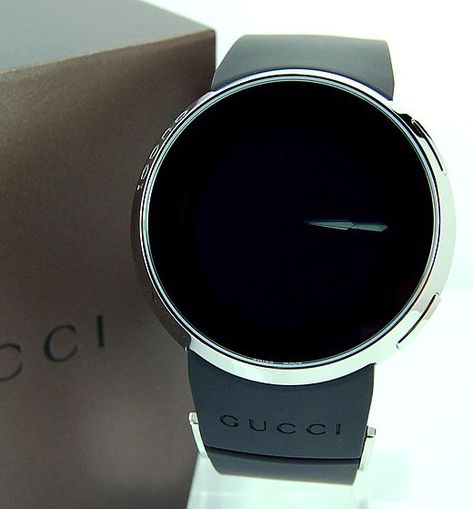 These luxury LCD watche feature a cool round white-on-black display, set behind a sturdy sapphire crystal made by Gucci. (OAP) Gucci Dress Casual, Gucci Dress, Gucci Mane, Gucci Watch, Wrist Wear, Well Dressed Men, Men's Watches, Gucci Men, Rolex Datejust