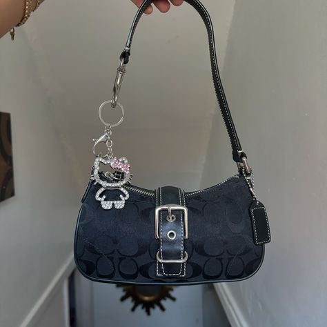 $220 free shipping 💌SOLD Y2K Coach Demi Black Buckle Hampton Shoulder Bag ⁩approx measurements 8.5” L 4.5” H 2” W with 7” drop - excellent condition🍒 charm included - very tiny and lightweight! super cute!! - magnetic buckle closure #coach #vintage #y2k #minimalistic #purse Coach Demi Bag Outfit, Coach Bags With Charms, Coach Bags Black, Coach Bag Charms, Coach Bag Charm, Tiny Purses, Vintage Coach Bags, Vintage Shoulder Bag, Bags Coach