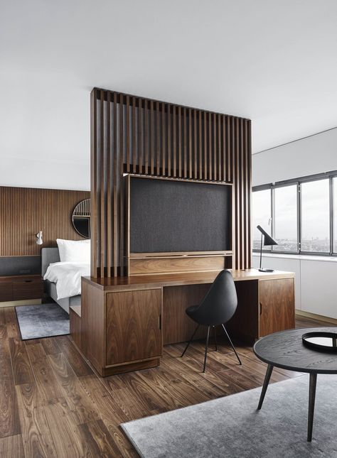 A guest room in the renovated hotel incorporates Jacobsen's furniture designs in contemporary materials. Bold Bedroom, Hotel Room Design, Bedroom Decor Design, Hotel Interiors, Design Hotel, Hotel Furniture, Bedroom Hotel, Arne Jacobsen, Hotel Interior