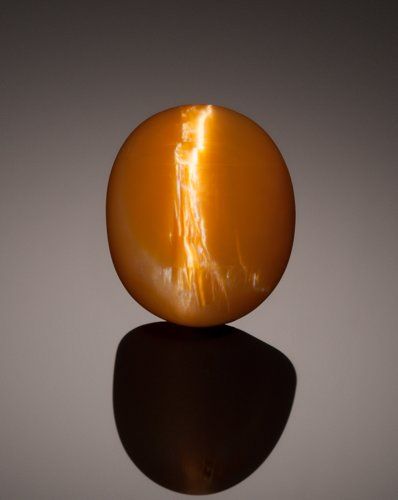 Gems:Cabochons, RARE GEMSTONE: CAT'S EYE OPAL - Measurements: 14.54 x 12.2 mm, 9.84 ct..Sold for: $750.00 Cats Eye Gem, Nature Science, Orange Gem, Soul Healing, Pretty Rocks, Cool Rocks, Tangerine Orange, Cats Eye, Cat Eyes