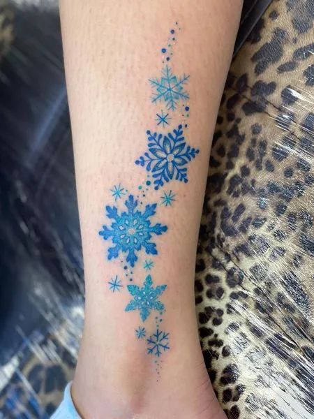 Blue Snowflake Tattoo Blue Snowflake Tattoo, Small Snowflake Tattoo, Tattoo Ideas And Meanings, Snowflake Tattoos, Snowflake Tattoo, Snow Tattoo, Hexagon Tattoo, Stained Glass Tattoo, Snow Flake Tattoo